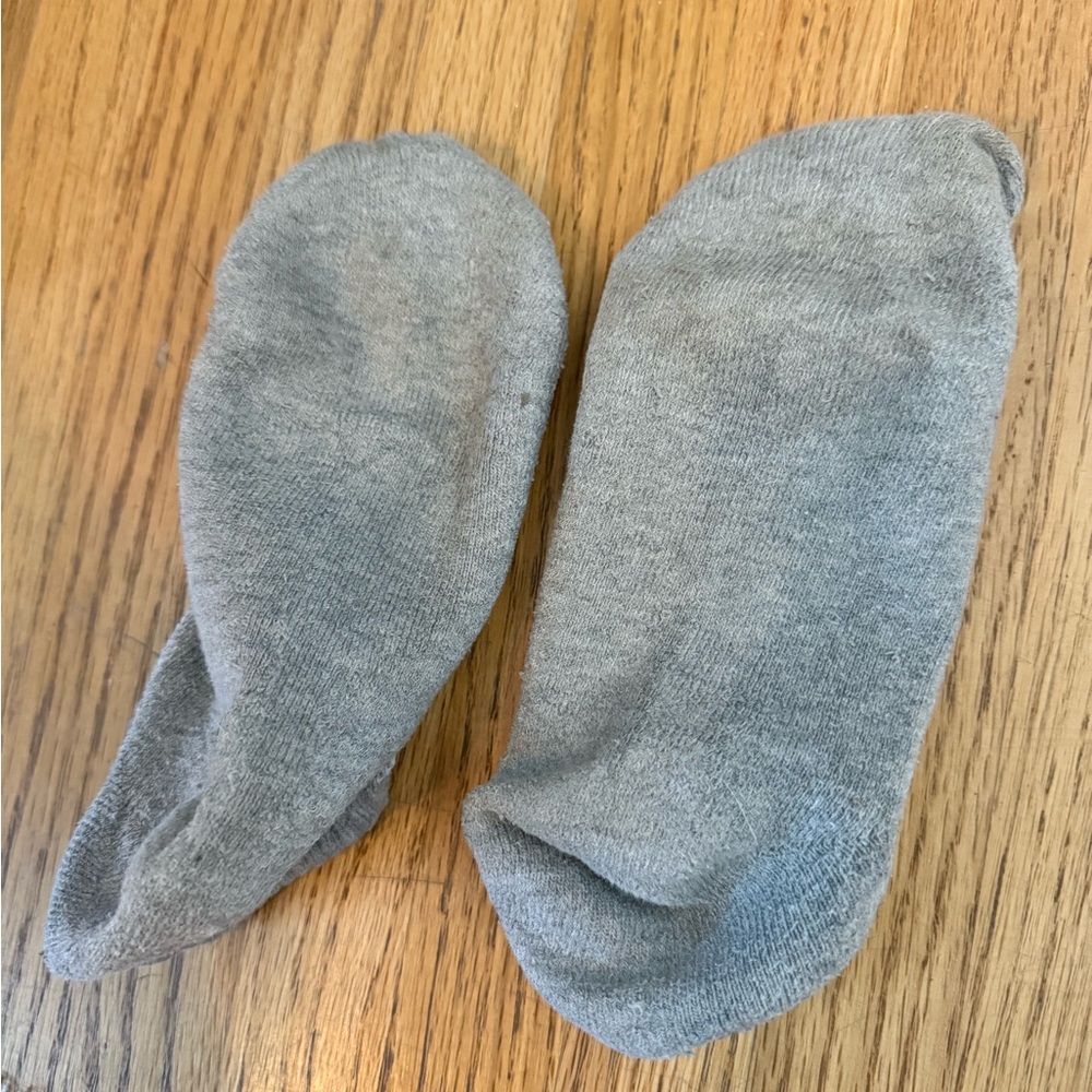 Well worn gray ankle socks